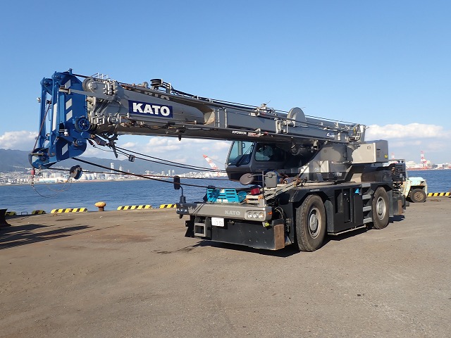 Used Kato mobile crane parked at a Japanese port